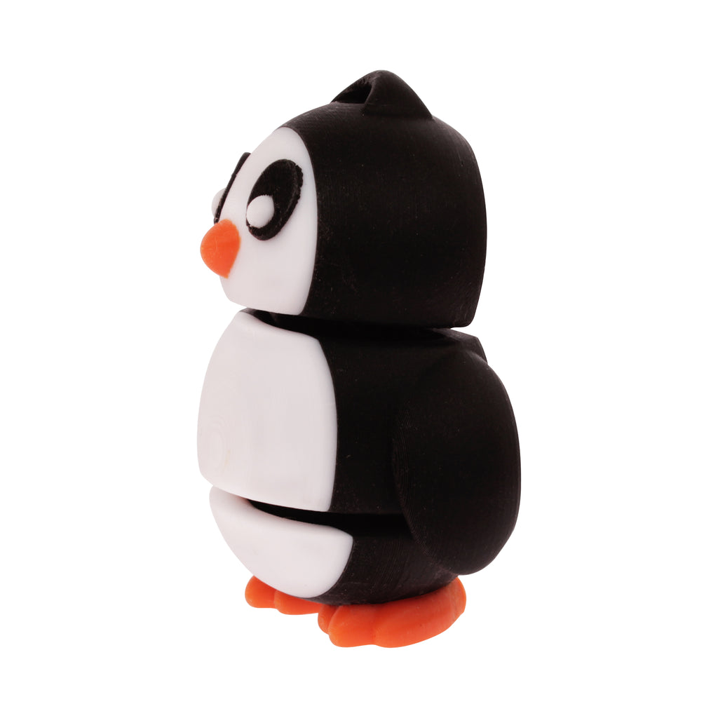 Left Side of 3D Printed Flexible Penguin Keychain made from renewable PLA in vibrant colors